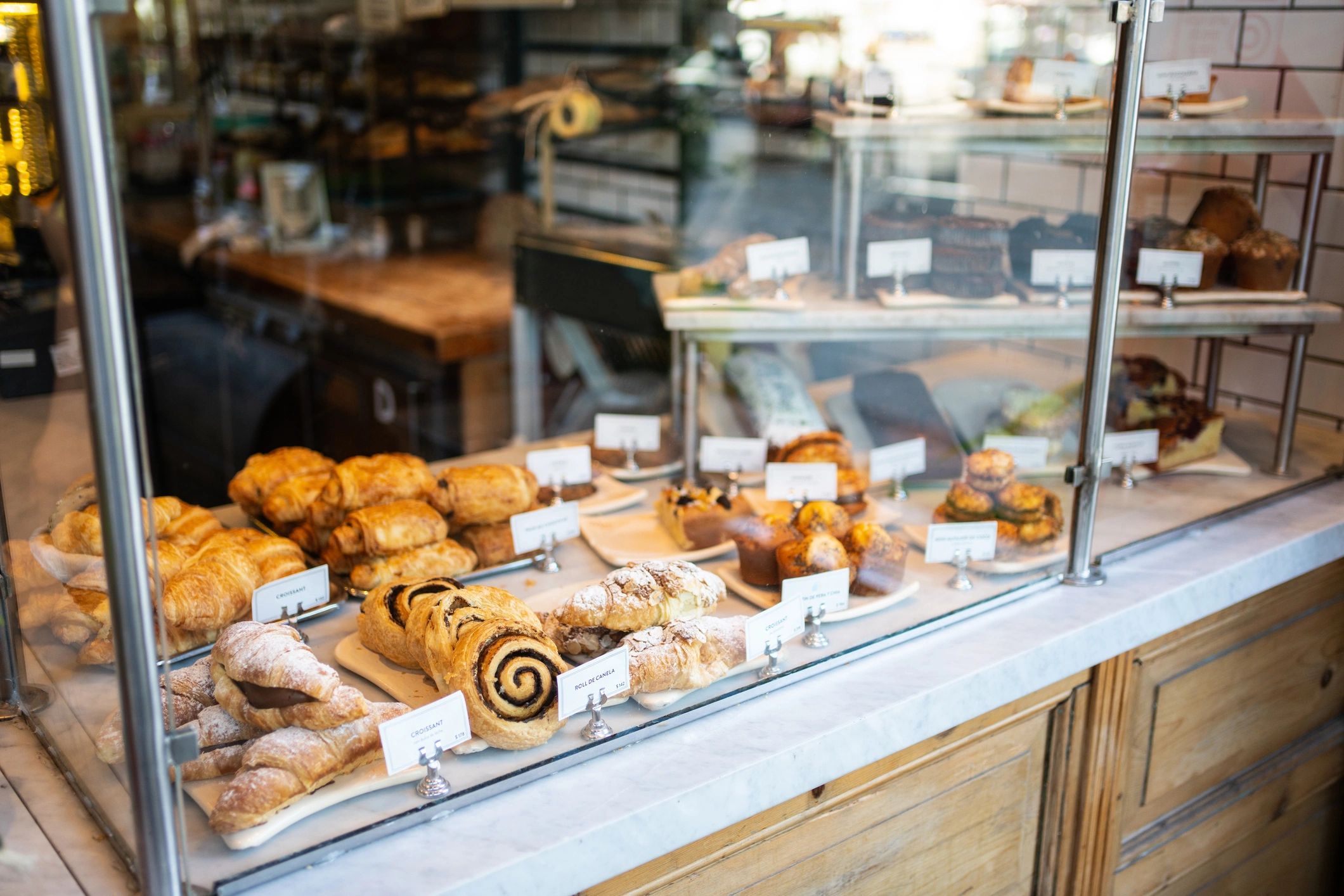Baked goods in a glass bakery cabinet
