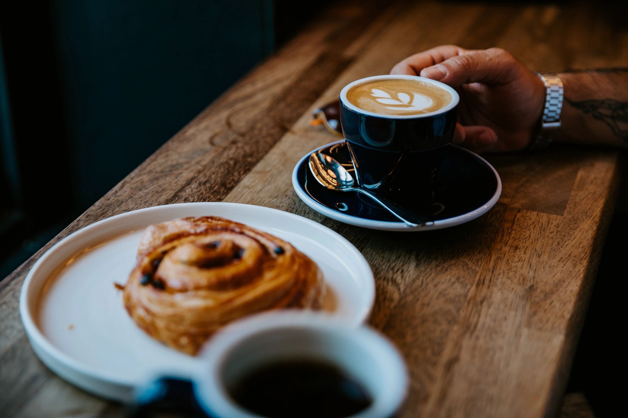 Coffee with latte art, perfect with a pastry